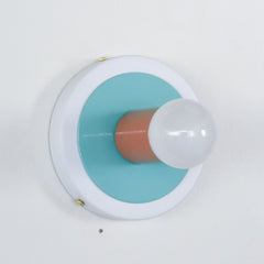 Peach, Pastel blue aqua, and White wall sconce or flushmount ceiling light fixture.  adds a pop of color to any space
