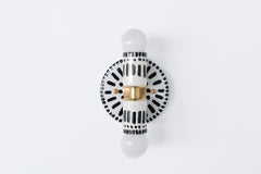 Handpainted black and white patterned wall sconce inspired by Greece & Portugal.  Maximalist style wall sconce that has a natural element because each one is hand-painted.  The painted thalia is a perfect small sconce that doubles as a statement light fixture because of the bold design.  Great for bathrooms, hallways, and more.   