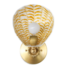 Sun-warmed elegance meets sculptural whimsy. This one-of-a-kind version of our Coquille Sconce features a hand-painted ceramic shell in soft cream, layered with golden ochre brushstrokes that ripple across its fluted form like morning light on water. Paired with detailed brass-toned hardware, this variation feels vintage, refined, and full of warmth.

As with our other One of One drops, this exact sconce won’t be repeated. It’s a functional art piece made for collectors of the strange, the beautiful, and th