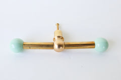 Mint Green & Brass long drawer pull with a pop of color