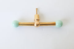 delicate pastel mint green & Brass long drawer pull with a pop of color. Modern geometric shape. Maximalist or eclectic interior design drawer pulls.