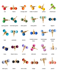 Double Gumball Knob full color chart showing all 30 colorways with brass hardware: red, flame, orange peel, matte mustard, yellow, chartreuse, spring green, mermaid green, olive green, vista green, mint, lagoon, teal, poolside, denim, mediterranean blue, hydrangea blue, celestial blue, navy, black cherry, orchid, doll pink, blush pink, white, slate grey, black, terra cotta, fudge, cream, and peach.