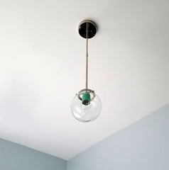 Modern glass globe pendant light fixture in chrome brass with color
