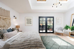 Meric Chandelier in a modern master bedroom design in California