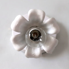White floral adjustable wall sconce front view