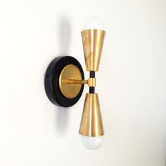 black and gold art deco geometric inspired wall lighting for bathroom renovations