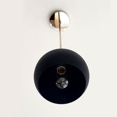 chrome and matte black globe shaped pendant lighting mid century inspired