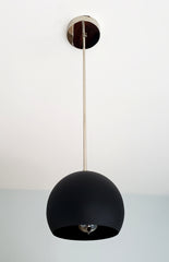chrome and matte black globe shaped pendant lighting mid century inspired