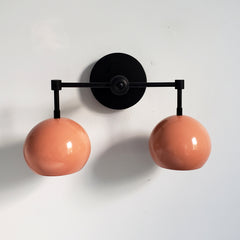 Black and peach modern two light wall sconce by Sazerac Stitches