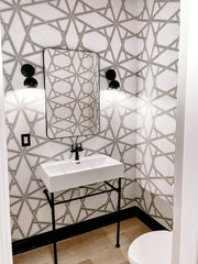 black and white modern monochromatic bathroom with wallpaper