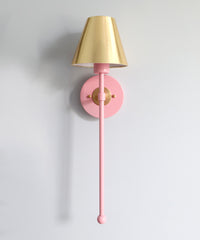 Light Pink and brass accent lighting from the front