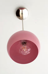 Chrome and Pink globe shape pendant light inspired by midcentury modern design