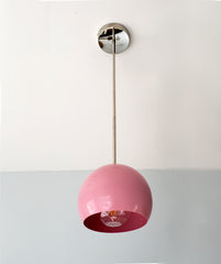 Chrome and Pink globe shape pendant light inspired by midcentury modern design
