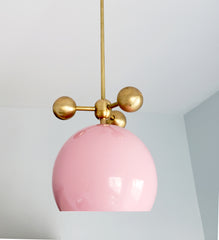 millennial pink and brass modern globe pendant with brass orb ball details midcentury inspired