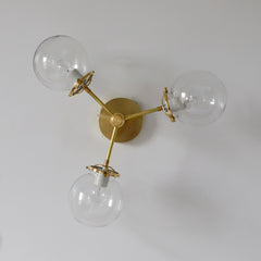 Brass and clear globe glass flushmount ceiling light fixture 
