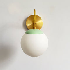Brass and Mint Fontainebleau curved arm sconce modern design