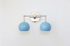 Light Blue and chrome two light mid century modern wall sconce