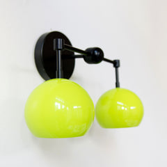 black and chartreuse two light mid century modern wall sconce