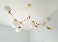 organic asymmetric large brass chandelier with white glass modern contemporary lighting light fixture brass