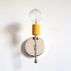 chrome and mustard modern wall lighting sconce colorful interior design