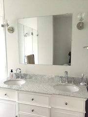 white double vanity bathroom marble countertop chrome sconces