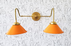 Orange and Brass two light bathroom wall sconce