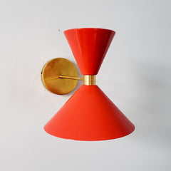 poppy red and brass midcentury modern cone shaped wall sconce by sazerac stitches