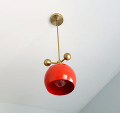 flame orange and brass modern globe pendant chandelier with brass orb ball details midcentury inspired
