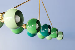 Green Ombre and Brass chandelier by Sazerac Stitches