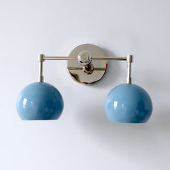 light blue and chrome mid century modern two light wall sconce