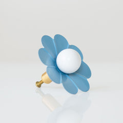 Pastel blue and white flower drawer pull in the shape of a daisy