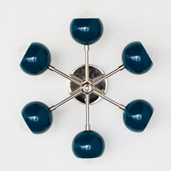 Chrome and dark turquoise mid century modern inspired ceiling light fixture with globe shades and chrome hardware.  Colorful lighting option for shorter ceilings, bedrooms, nurserys, bathrooms, and more.