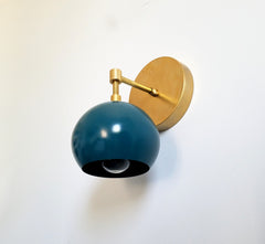 brass and teal mid century eyeball shade wall sconce