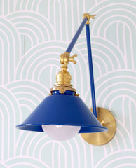Bright blue and brass adjustable wall cone sconce for kitchens, bedrooms, and more
