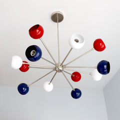 Red white and blue modern sputnik style chandelier with globe shades made by Sazerac Stitches