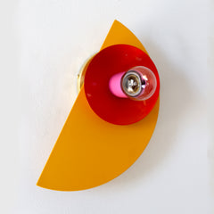 Mustard, Poppy Red, and Pink Kin Sconce from the side