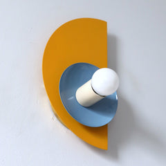 Mustard and Light Blue Bauhaus inspired wall sconce from the side
