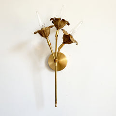 Brass floral bouquet wall sconce front view with adjustable flowers