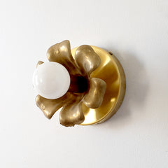 Brass flower sconce or flushmount ceiling fixture angled view
