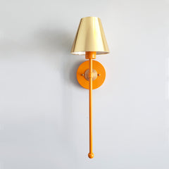 modern orange and brass wall sconce with gold shade