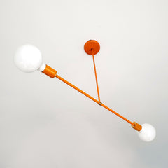 Bright orange and brass modern chandelier.  Colorful modern chandelier design
