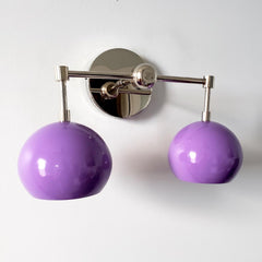 Chrome and purple midcentury modern two light wall sconce for bathroom renovations