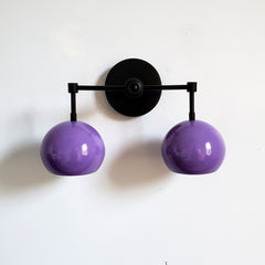 Purple and Black modern two light wall sconce with colorful midcentury modern inspired shades