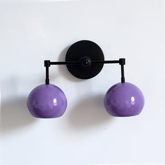 Purple and Black modern two light wall sconce with colorful midcentury modern inspired shades