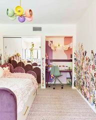 Pastel kids bedroom with an arco chandelier