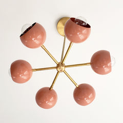 peach coral and brass midcentury modern inspired flushmount ceiling light fixture perfect for nursery decor