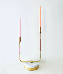 Peach and Pink colorblocked double candle holder with brass and marble finishes.