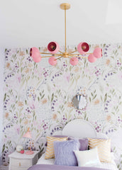 Pink and purple little girls bedroom design with wallpapered wall