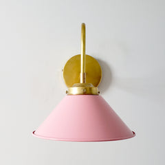 pink and brass farmhouse modern sconce in fun light pink color and brass.  Great kids room or nursery lighting decor idea.