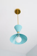 pastel blue and brass mid century modern inspired pendant light fixture for kitchen island design